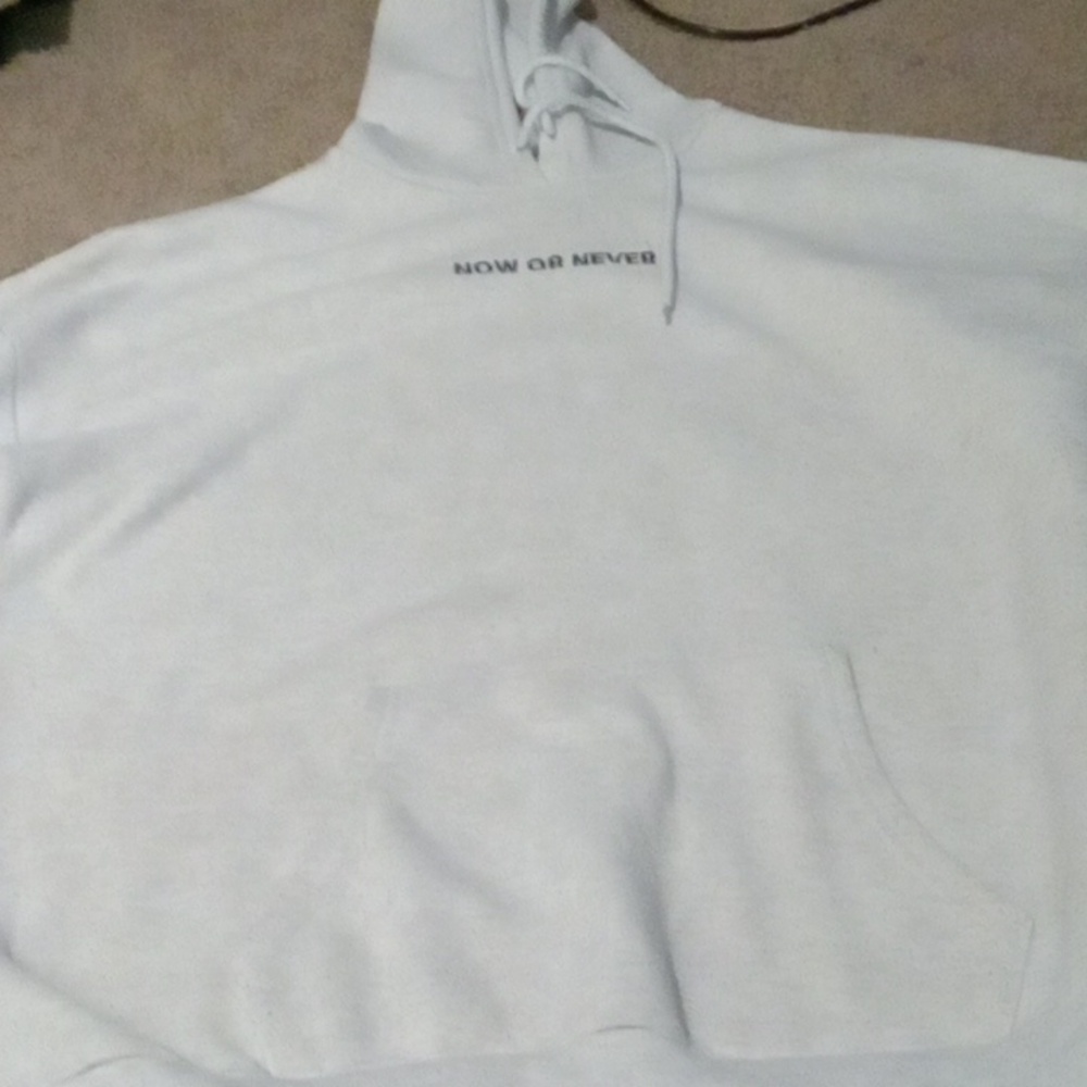 Rue 21 now or never sweatshirt  has little stain o I'm selling it for way less